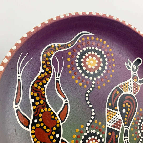 Hand-painted and artist signed Aboriginal terracotta plate