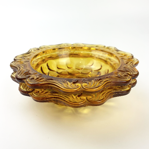 1960's amber glass mini bowls with intricate swirl edge