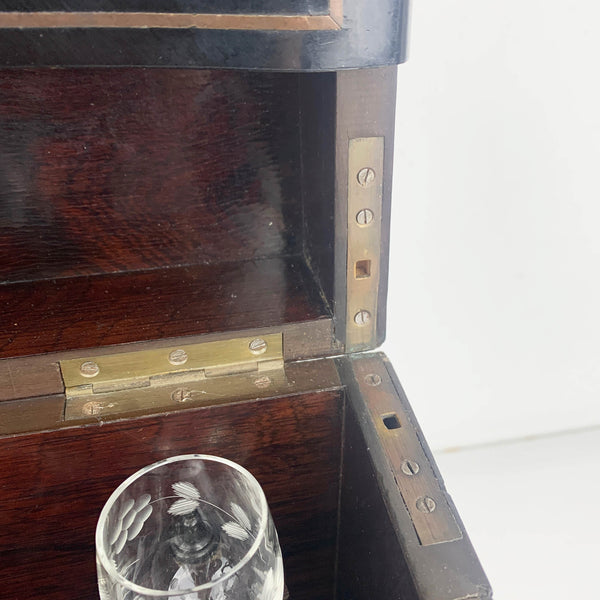 Antique French ebonized wood liquor cabinet with inlaid brass and mother of pearl detail