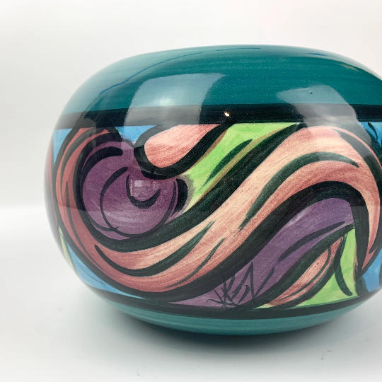 Colourful swirl design on pottery bowl