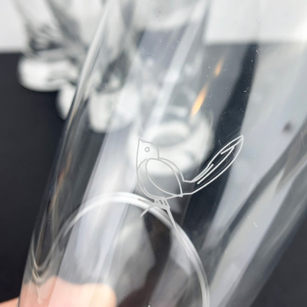 Engraved bird on glassware