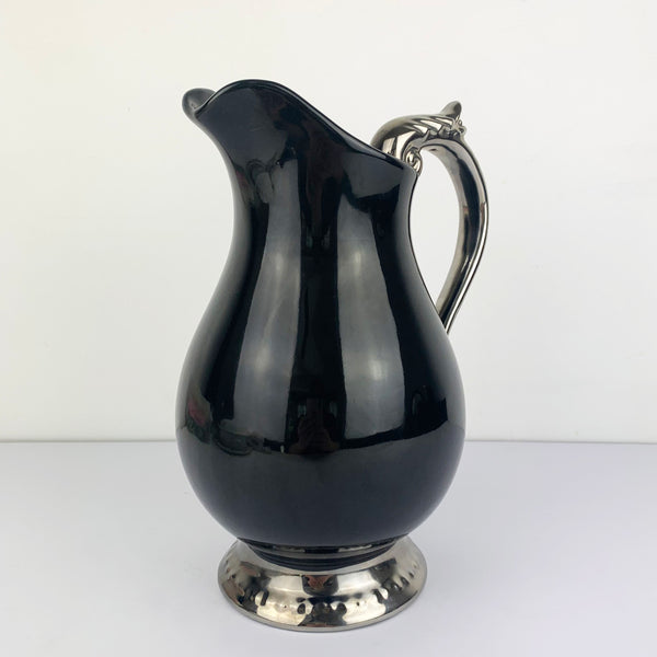 Black water pitcher viewed from front