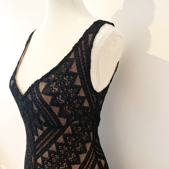 Bodice on black lace evening dress with nude underlay