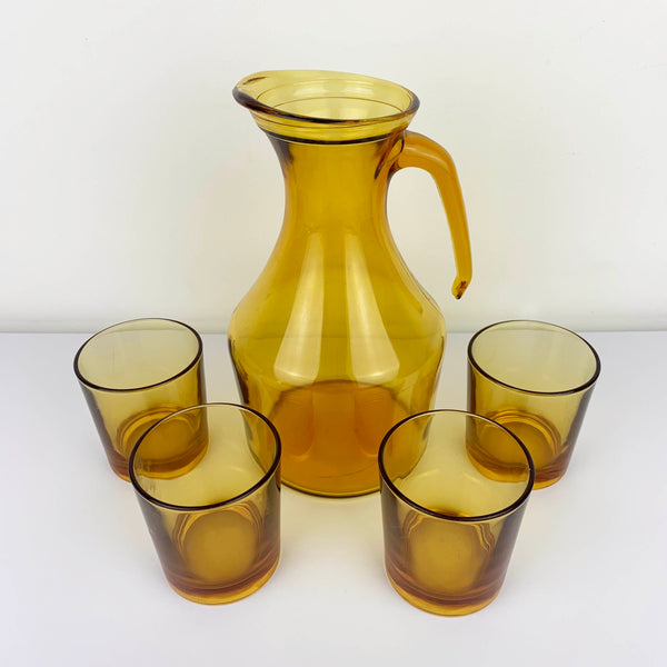 1970's pitcher and tumbler set in amber glass