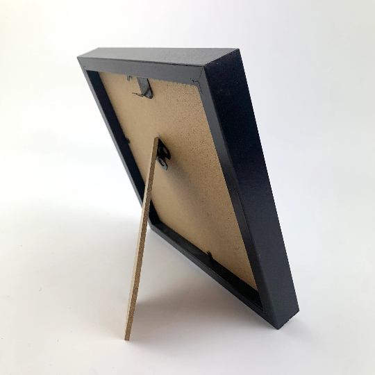 Framed art showing rear easel stand