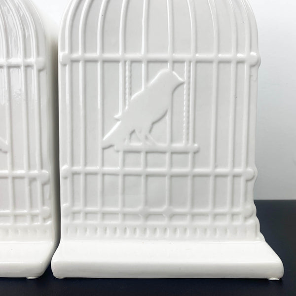 White ceramic birdcage bookends