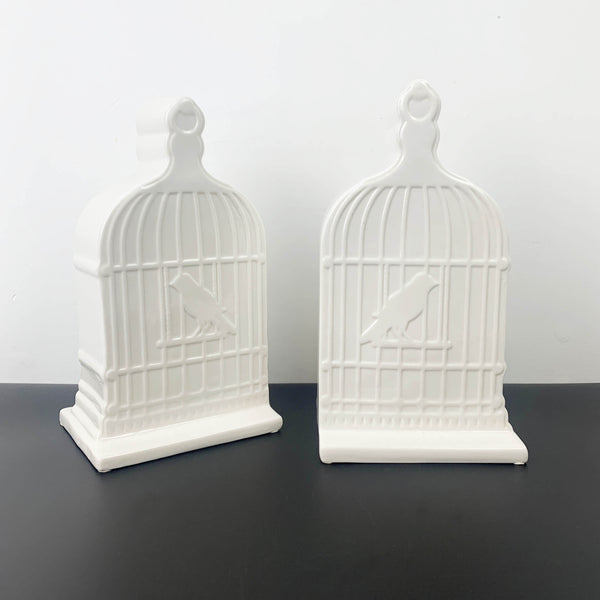 White ceramic birdcage bookends