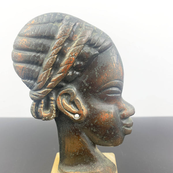 Copper African woman head sculpture on marble base