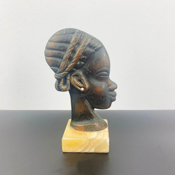 Copper African woman head sculpture on marble base