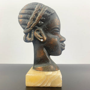 Copper African woman head sculpture on marble base