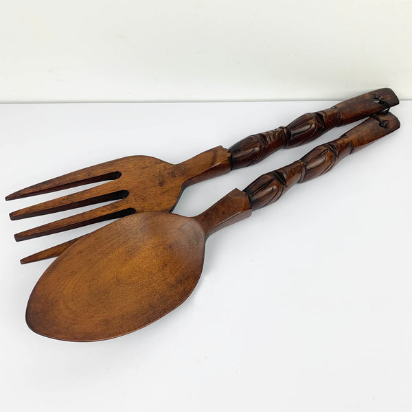 Large carved wooden cutlery wall hanging