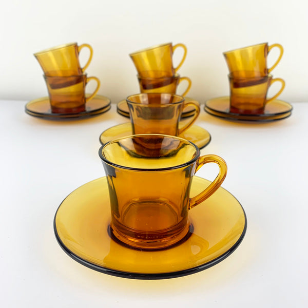 Amber glass cup and saucer set