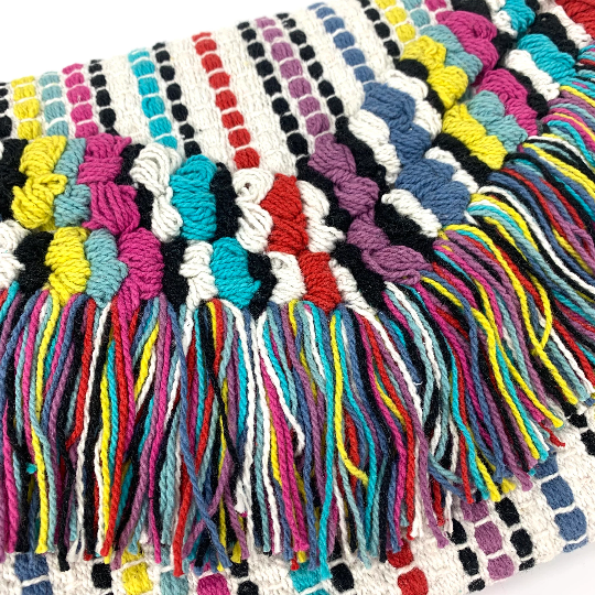 Embroidered cotton multi coloured clutch front tassel detail