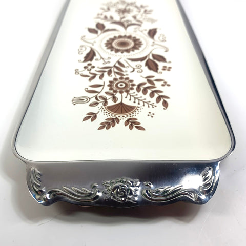 Stainless steel tray with enamel floral insert