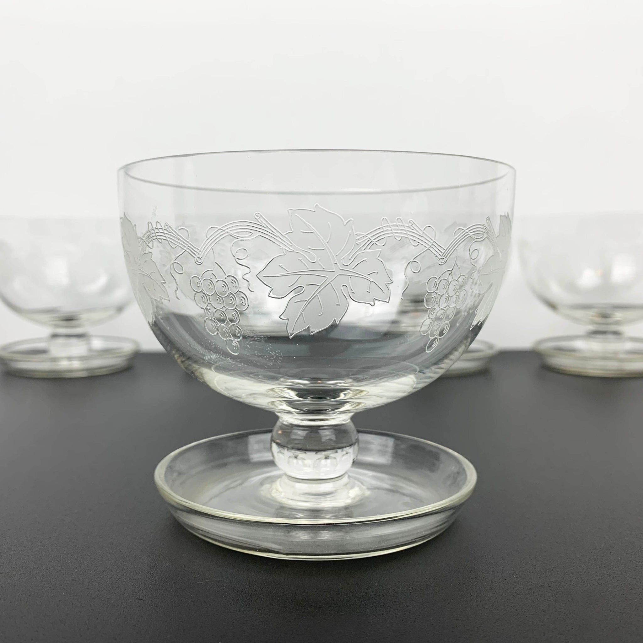 Crystal grapevine etched footed dessert bowls