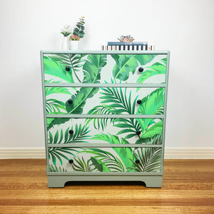 Beautiful sage green 4 drawer chest featuring a fern design artwork.