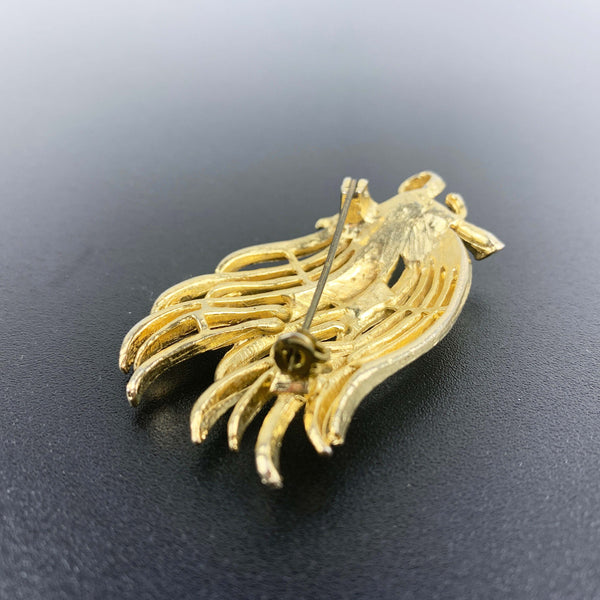 Gold toned feathered leaf style brooch