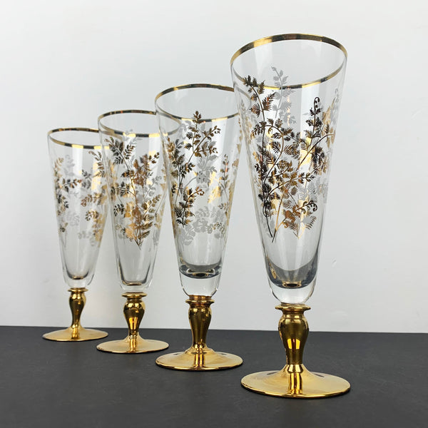 Mid century footed champagne glass with elegant gold leaf decoration