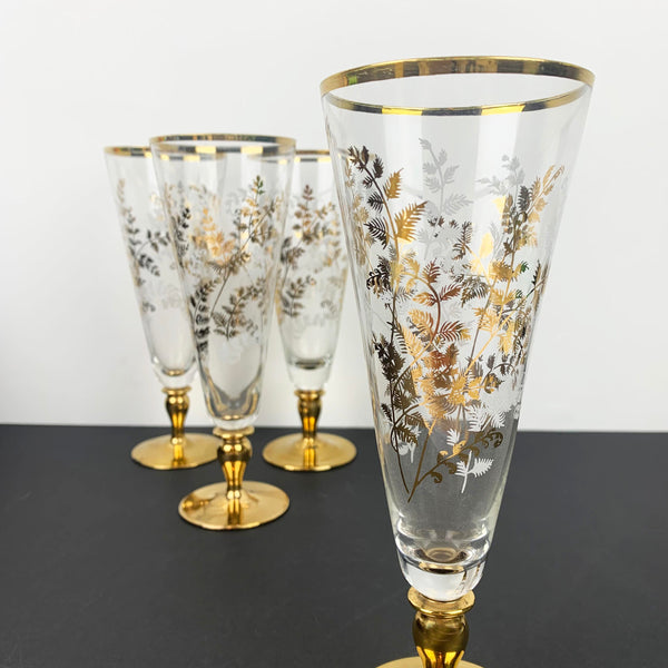 Gold and white leaf pattern on vintage champagne flute