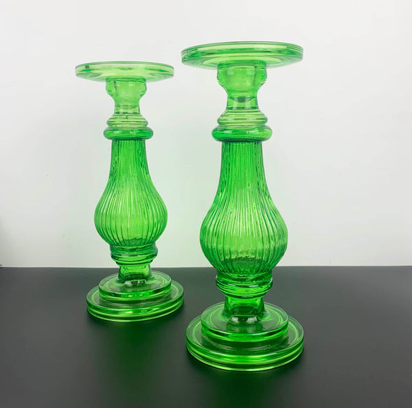 Green glass statement candle holders