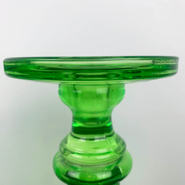 Green glass statement candle holders