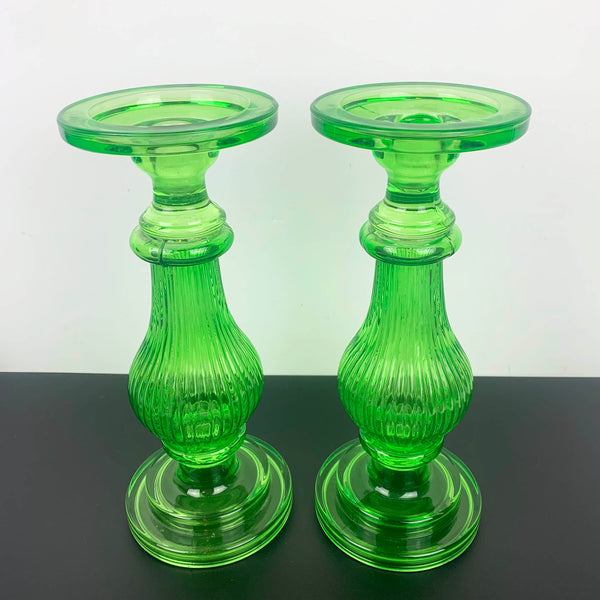 Green glass statement candle holders