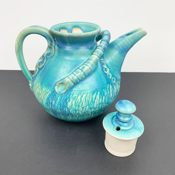 Gympie Pottery aqua blue tea pot with lid to side