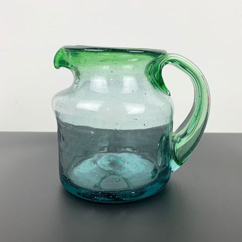 Rustic hand made blue and green glass jug