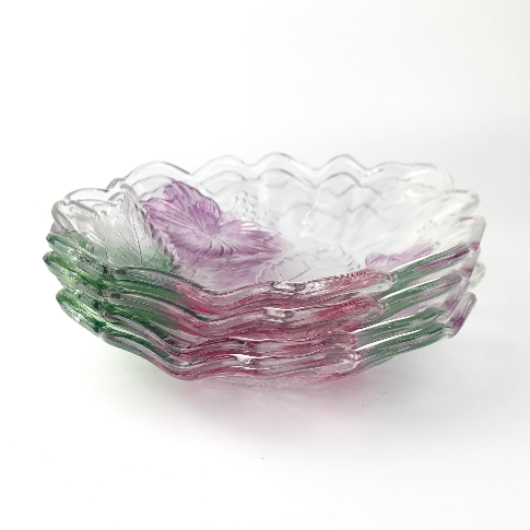 Tinted glass hibiscus bowls stacked