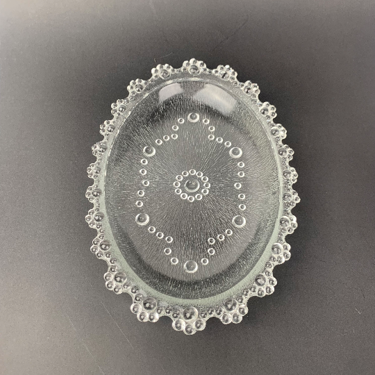 Small oval hobnail plate