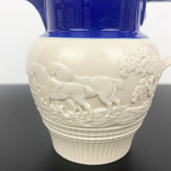 Antique English feldspathic stoneware small jug with fox hunt scene