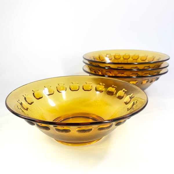 Vintage amber glass bowl set with apples around rim