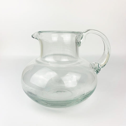 Round glass water and juice pitcher