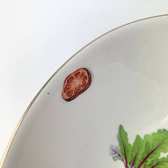 Silver trim on vintage ceramic bowl