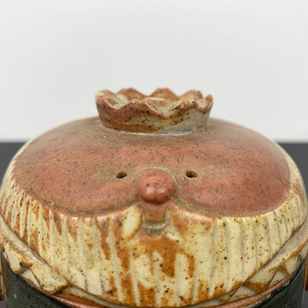 Gempo King lidded salt or spice box close up of crown and face