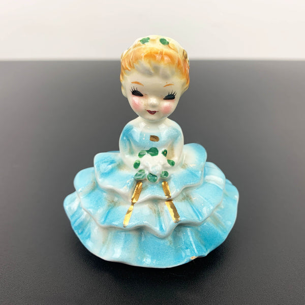 Miniature young girl in ball gown 1950's figurine