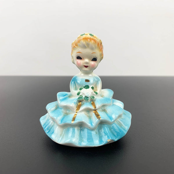 Miniature young girl in ball gown 1950's figurine