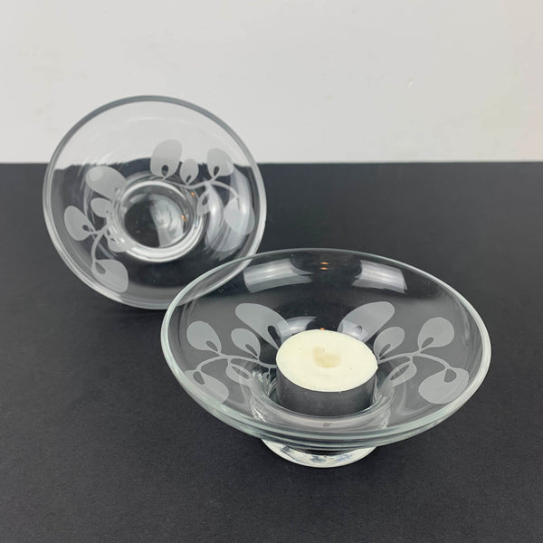 Glass tea light holders with frosted leaf detail shown on side