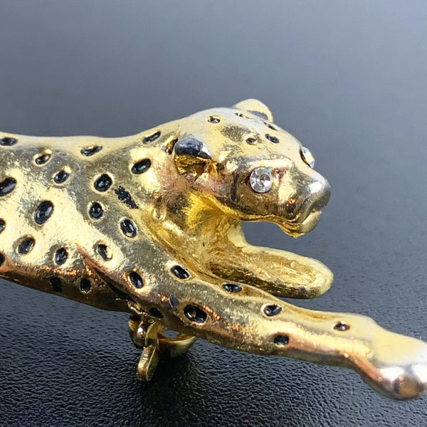 Gold leopard brooch with black enamel spots