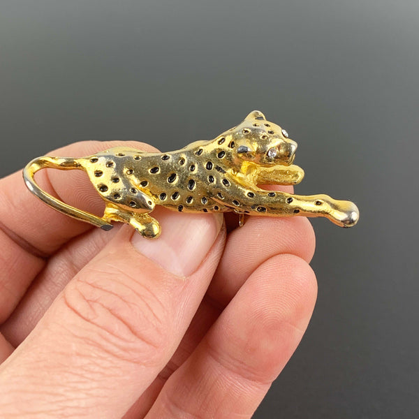 Gold leopard brooch with black enamel spots