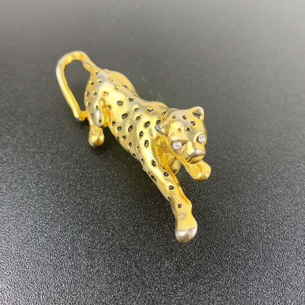 Gold leopard brooch with black enamel spots