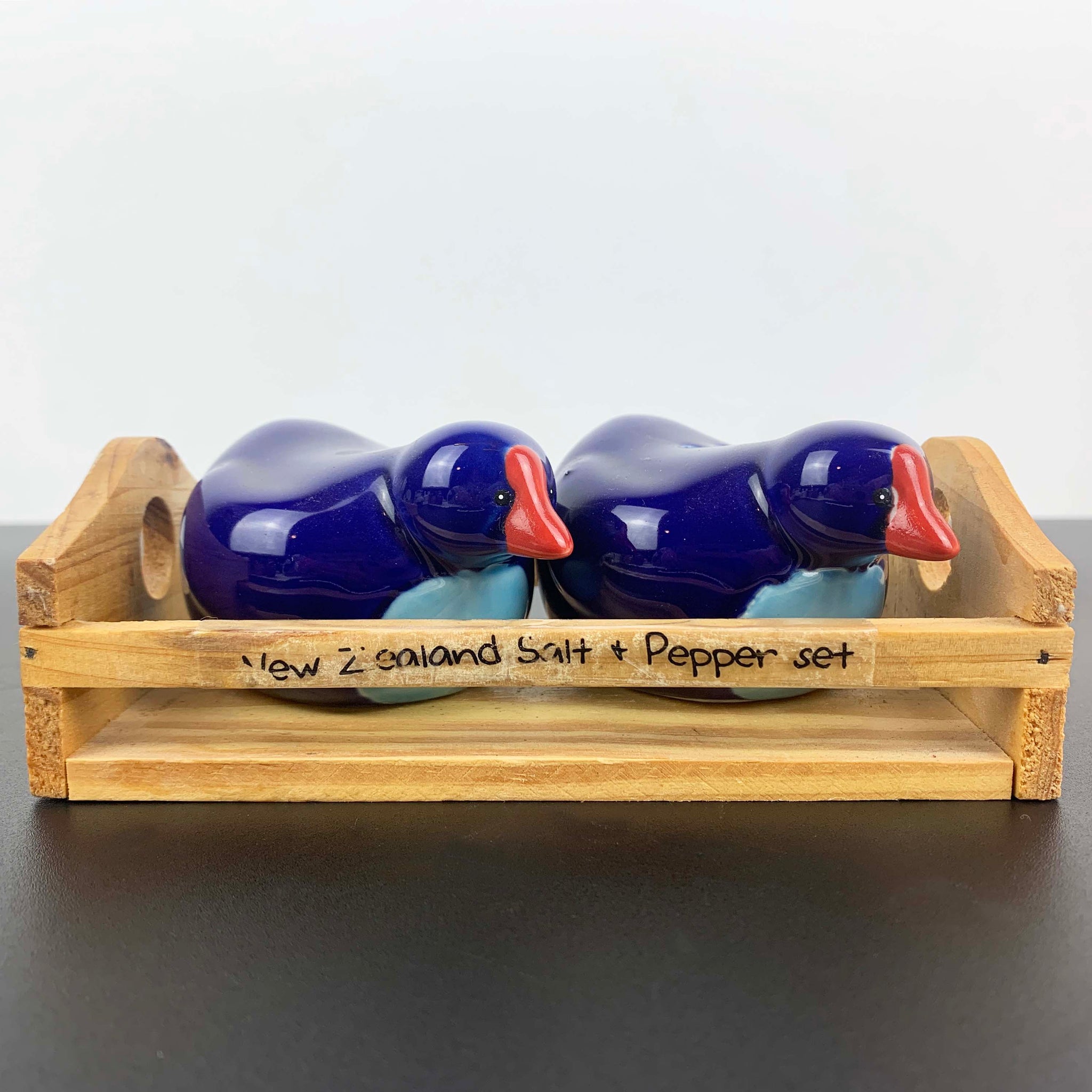 New Zealand Pukeko bird salt and pepper shakers on wooden tray