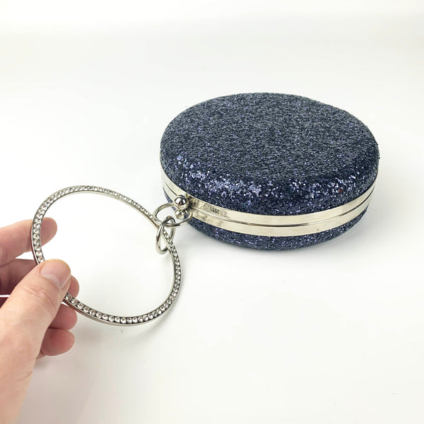 Klass UK round navy glitter clutch