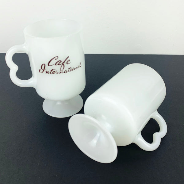 Vintage glass coffee mugs showing both sides