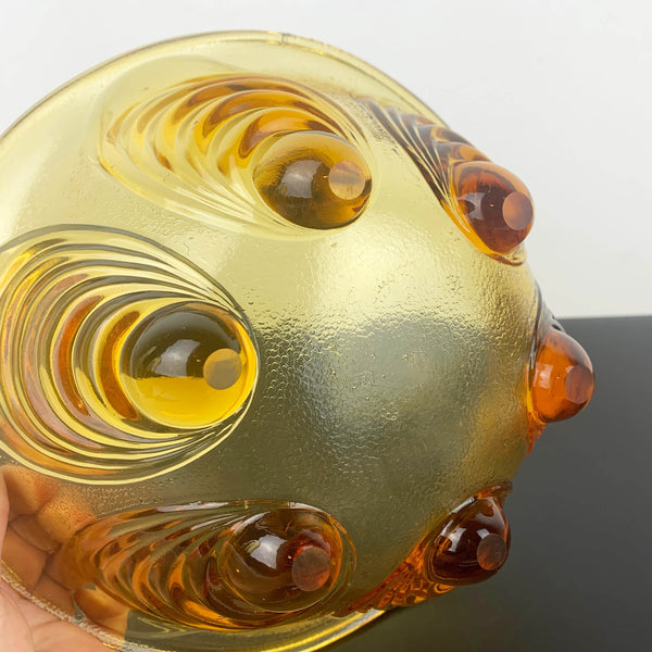 Amber glass peacock eye footed serving bowl