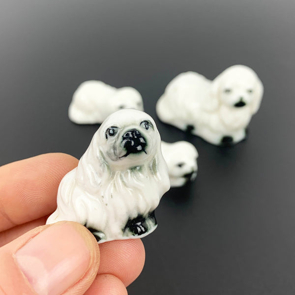 Miniature ceramic Pekingese dog family