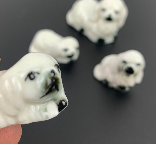 Miniature ceramic Pekingese dog family