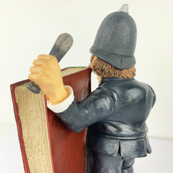 Rear of police sculpture bookend Peter Mook