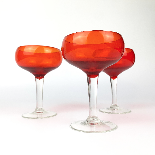 Red vintage champagne coupe