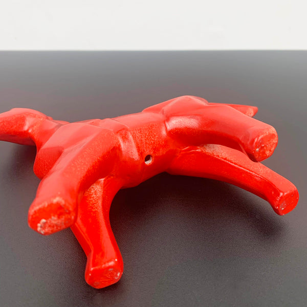 Red ceramic horse figurine